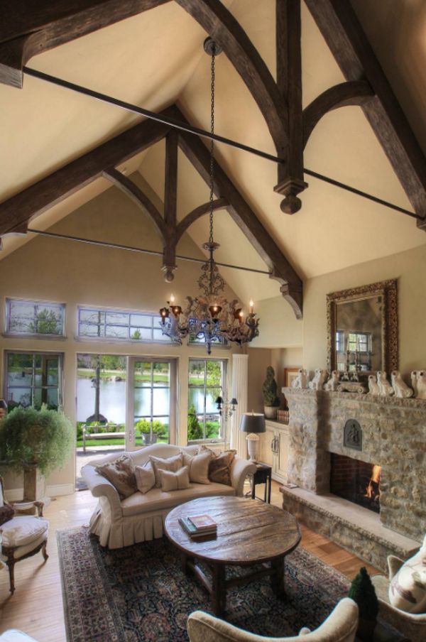 Example of a tuscan living room design in Boise with beige walls