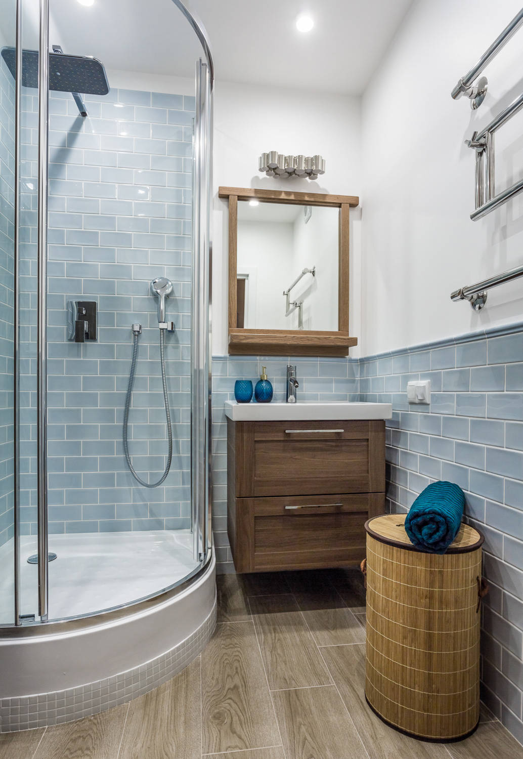 Family friendly bathroom blue tile shower