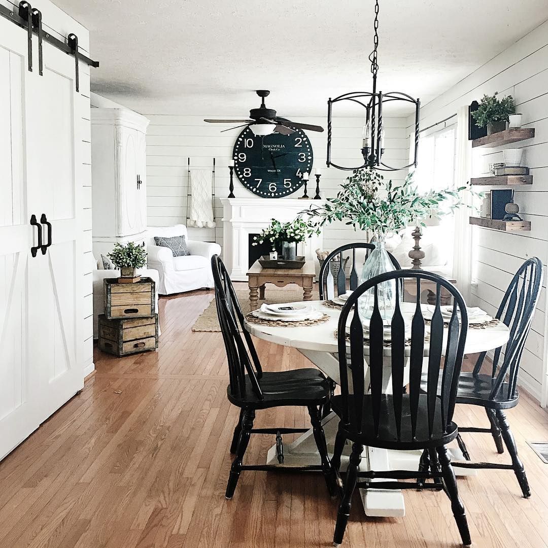 Farmhouse dining table with black chairs