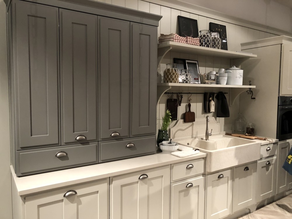 Farmhouse kitchen sink and grey cabinets