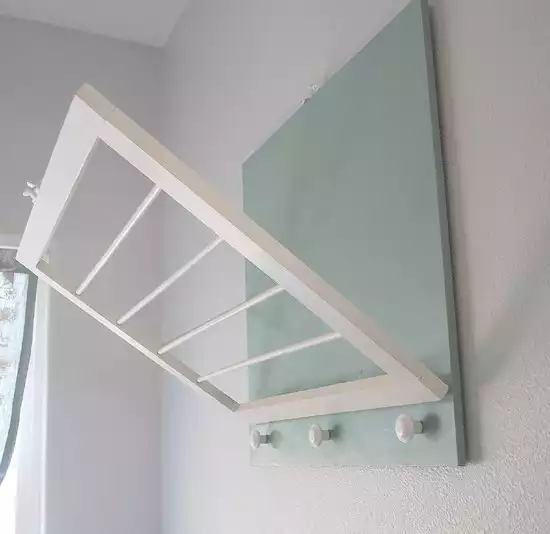 Flip down laundry rack