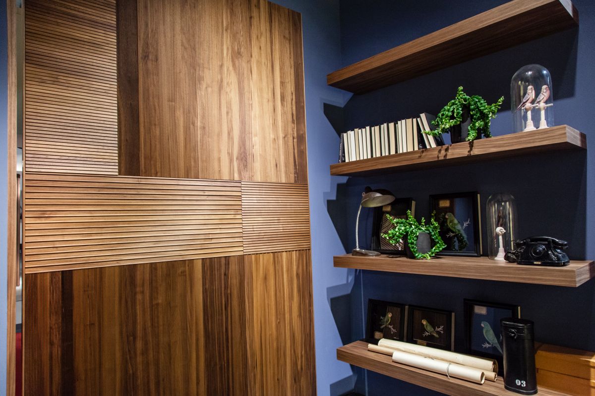Wood paneling as an accent or door front is a modern usage.