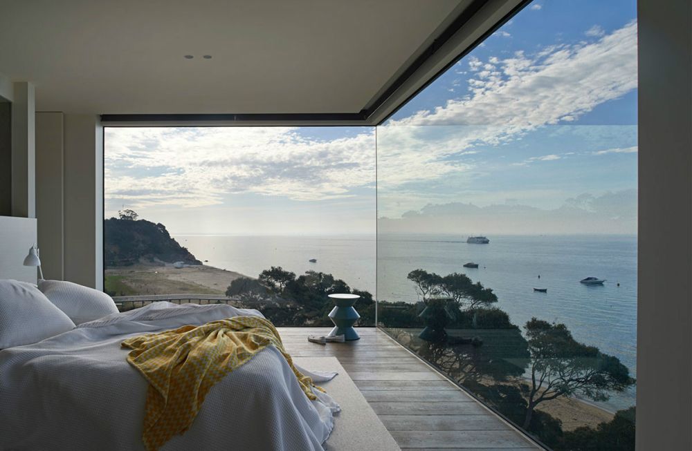 Floor to ceiling bedroom windows