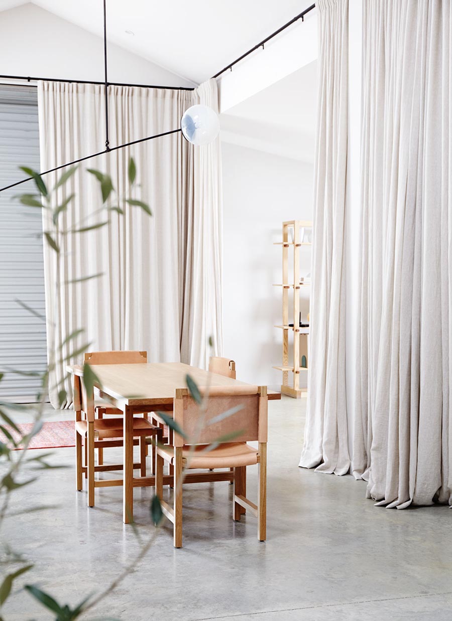 Floor to ceiling divider curtains polished concrete floor