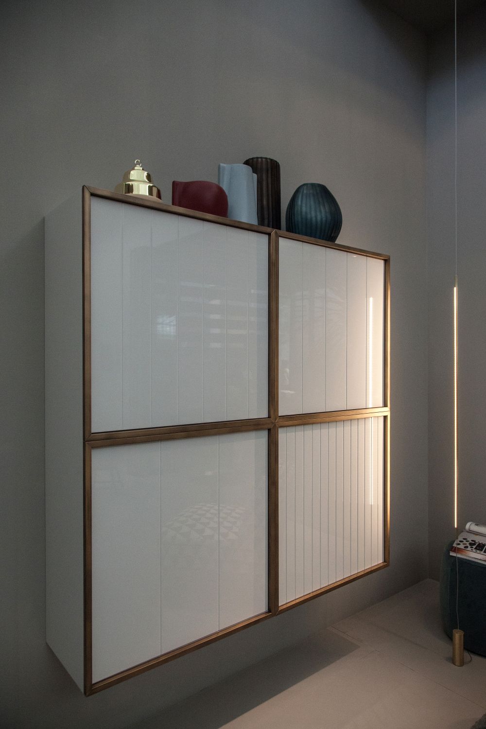 Four door wall unit in wood for living room storage