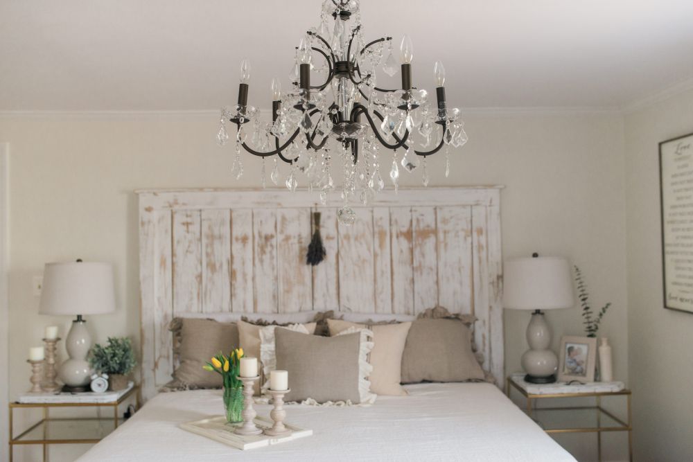 French country whitewashed headboard and chandelier inspiration
