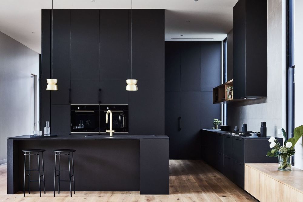 Full black kitchen decor with island and built in appliances