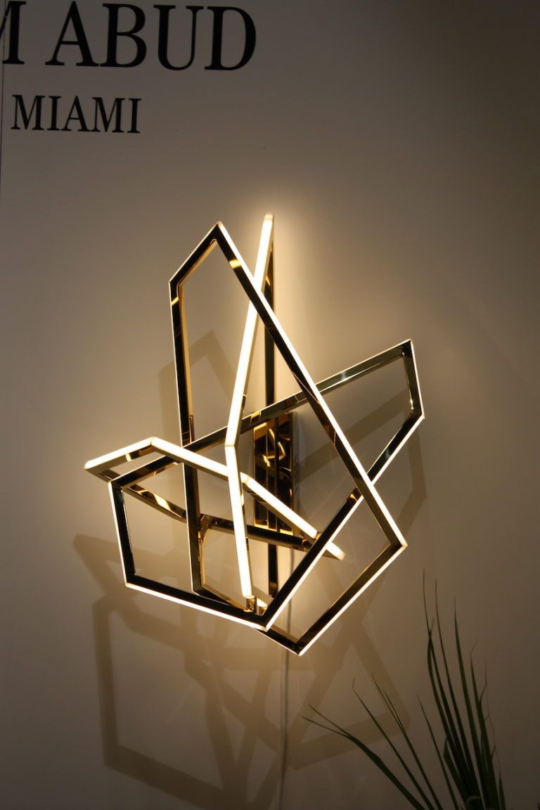 Using this type of light as a sconce is more novel than the typical sconce design.
