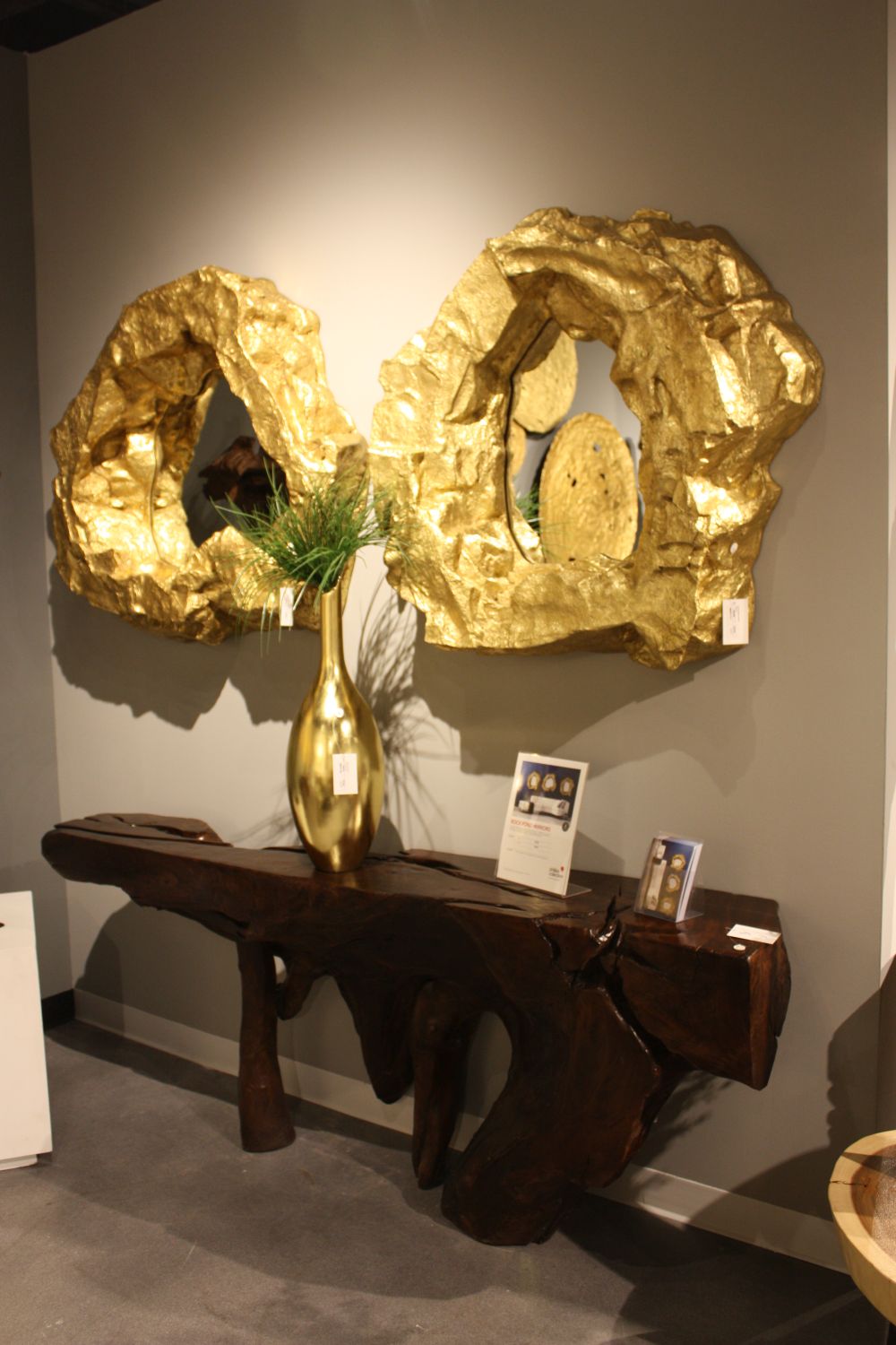 Glam mirror frames on the entryway above console