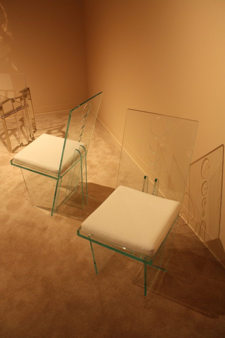 The chair is made from acrylic and polished nickel-plated steel and is offered by Michael Jon & Alan gallery.