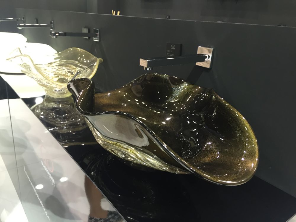 Glass blown vessel sink for an artistic look in bathroom