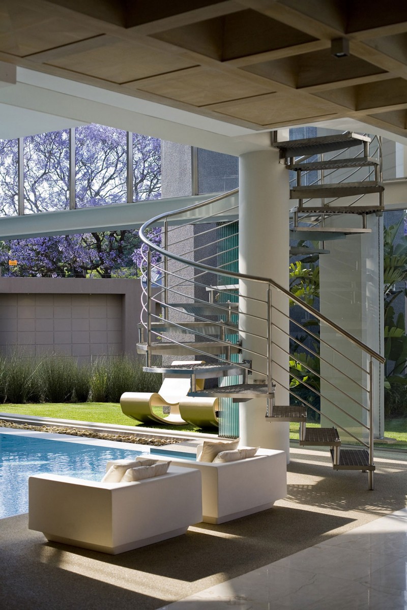Glass house with a circular staircase