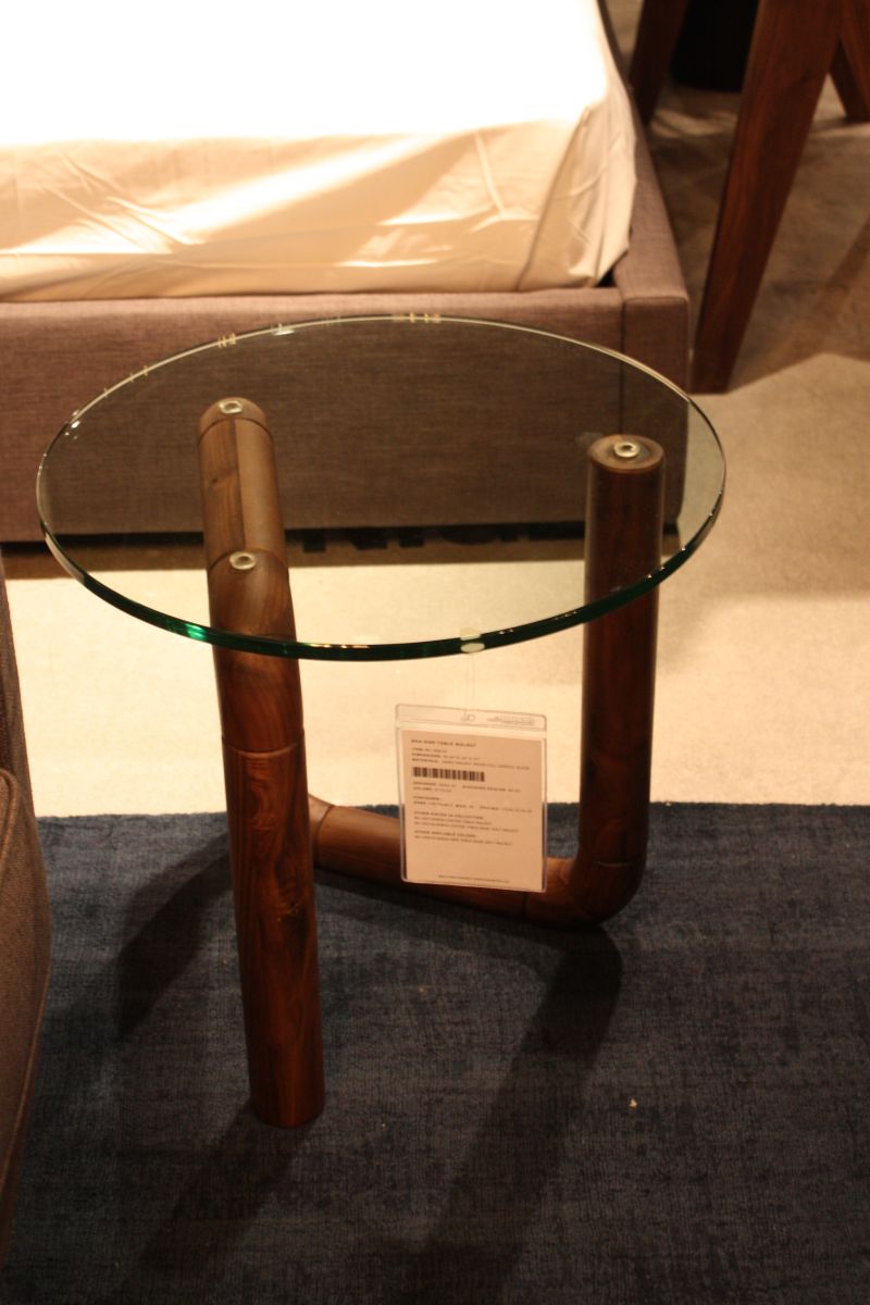 Glass top coffee table with walnut legs