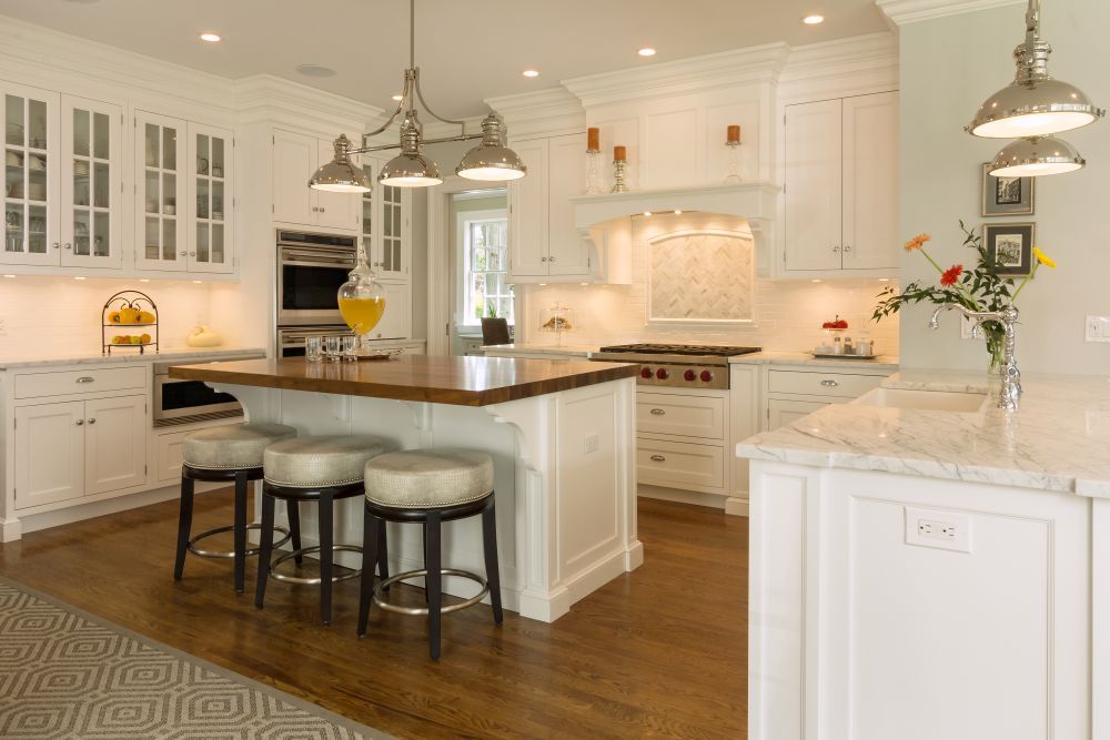 All white kitchen with bar stools