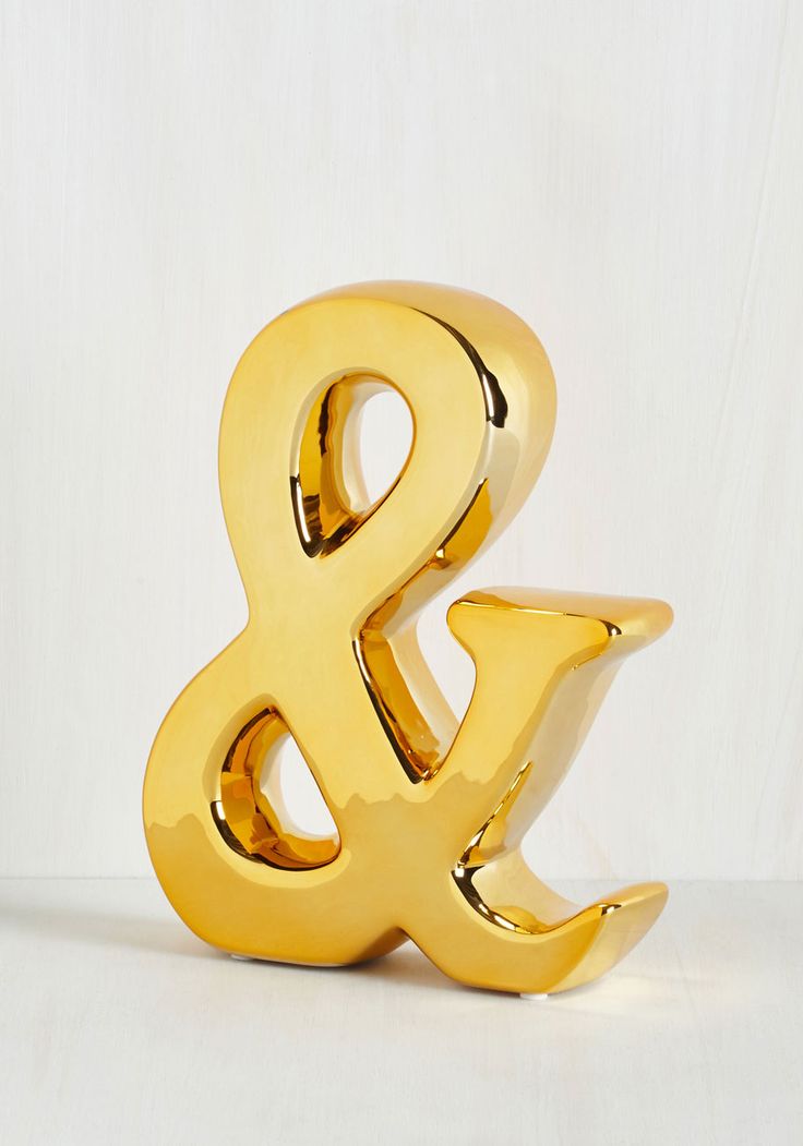 Gold ampersand figurine