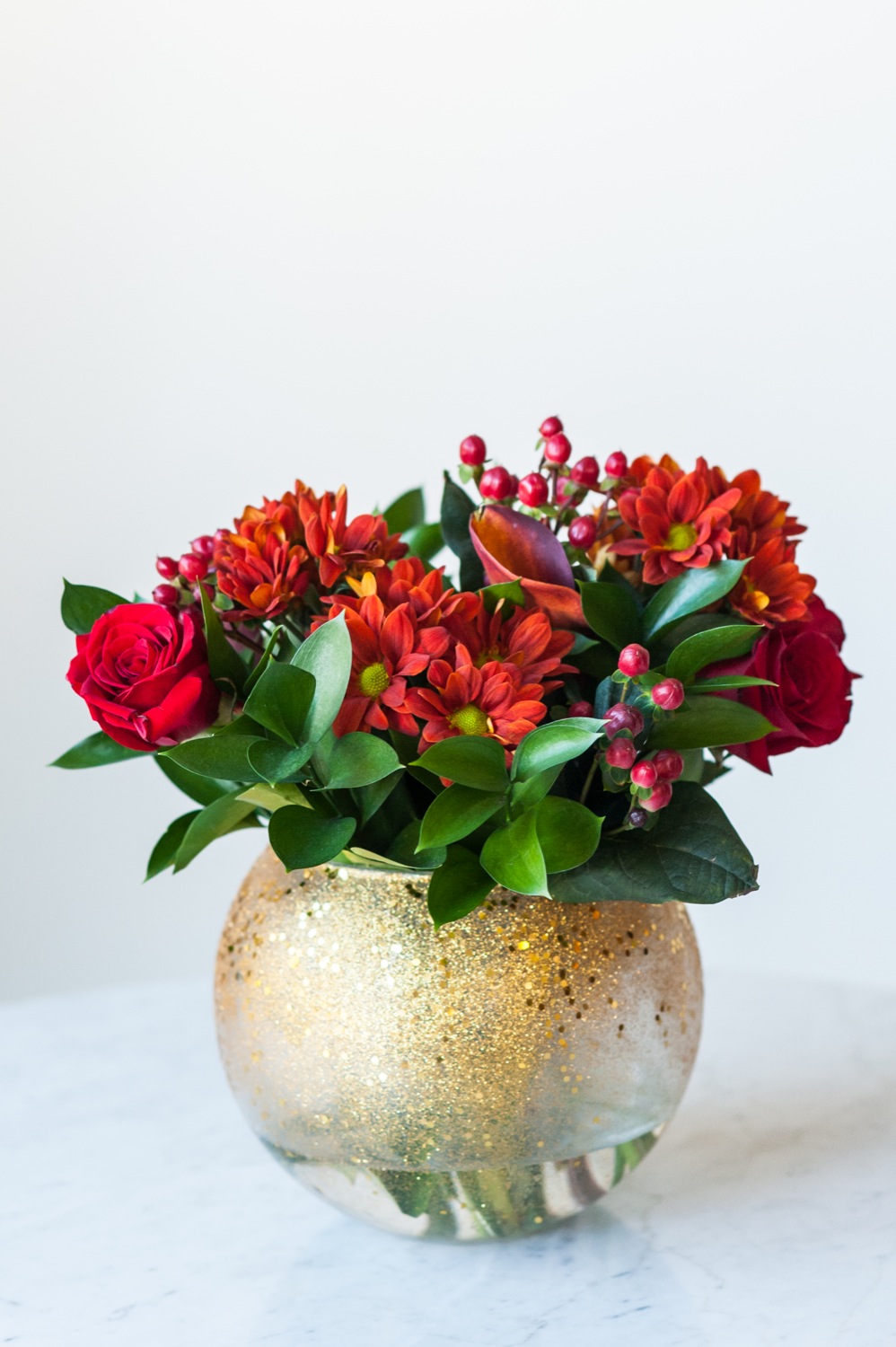 Gold glidded flower vase