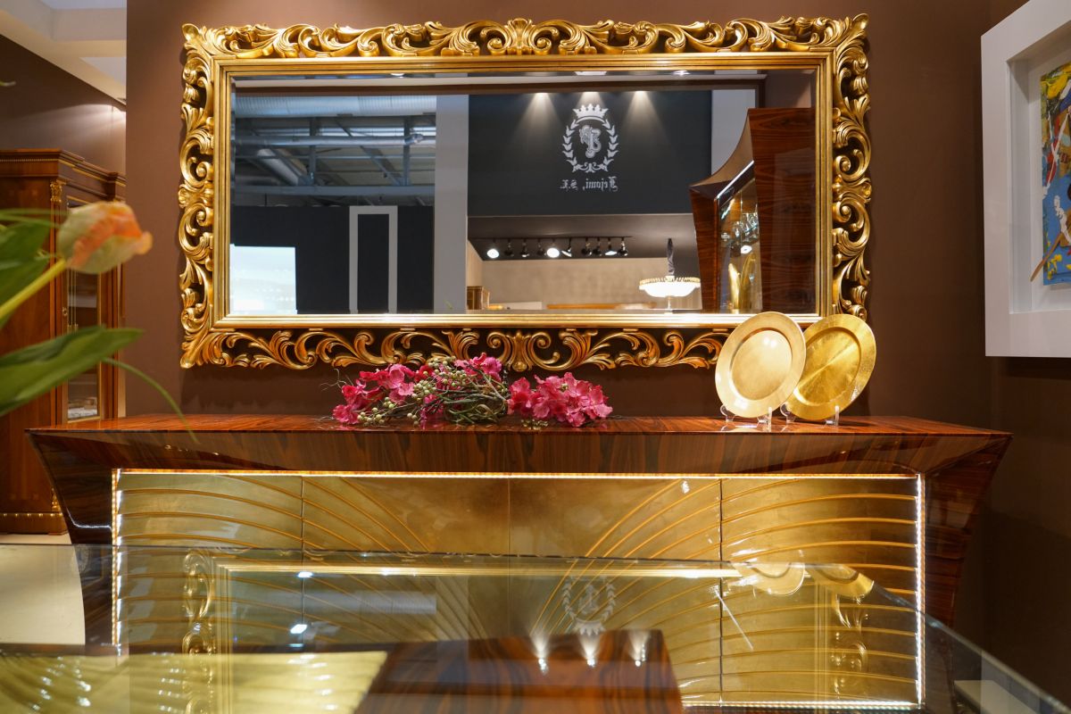 Gold leaf sideboard for dining area and rococo framed mirror