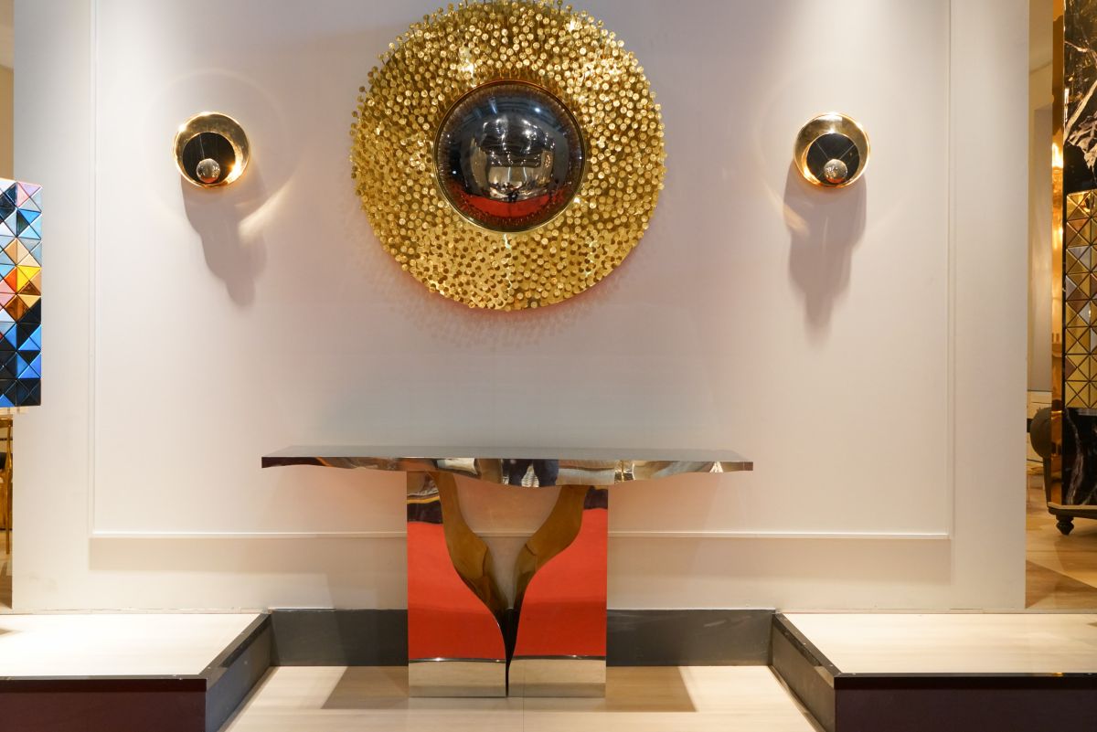 Gold modern console table and round mirror