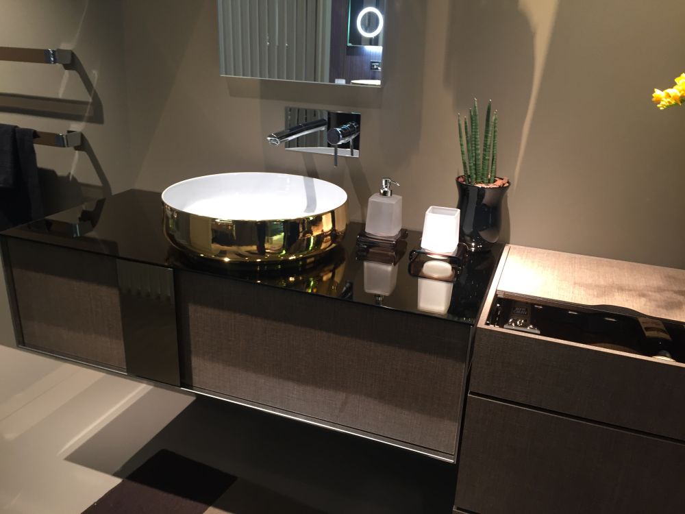 Gold sprayed vessel sink for a luxury look