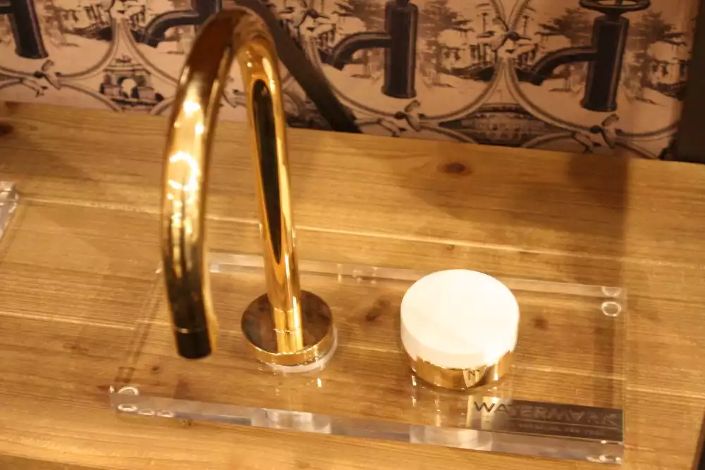 Gold watermark faucet design