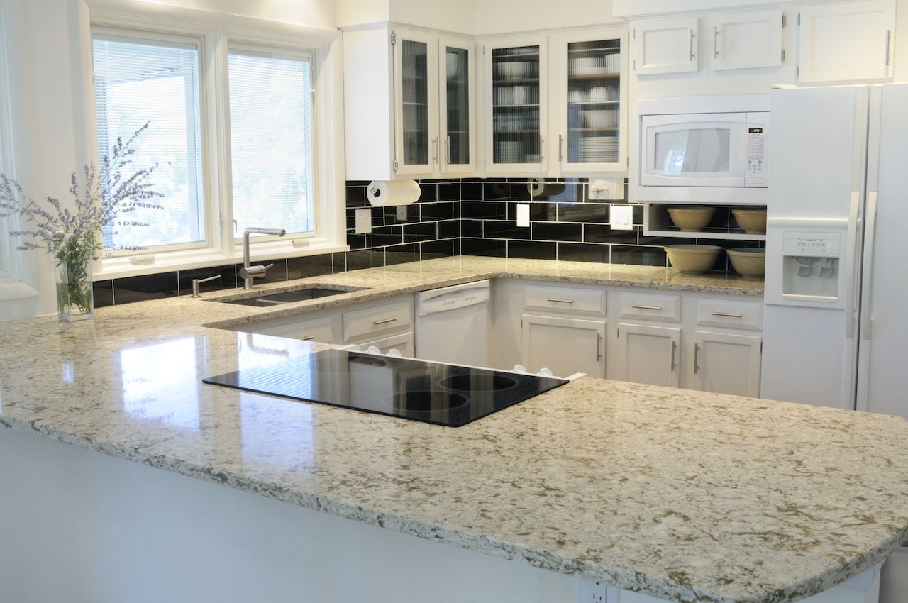 Granite countertop with built in cooktop