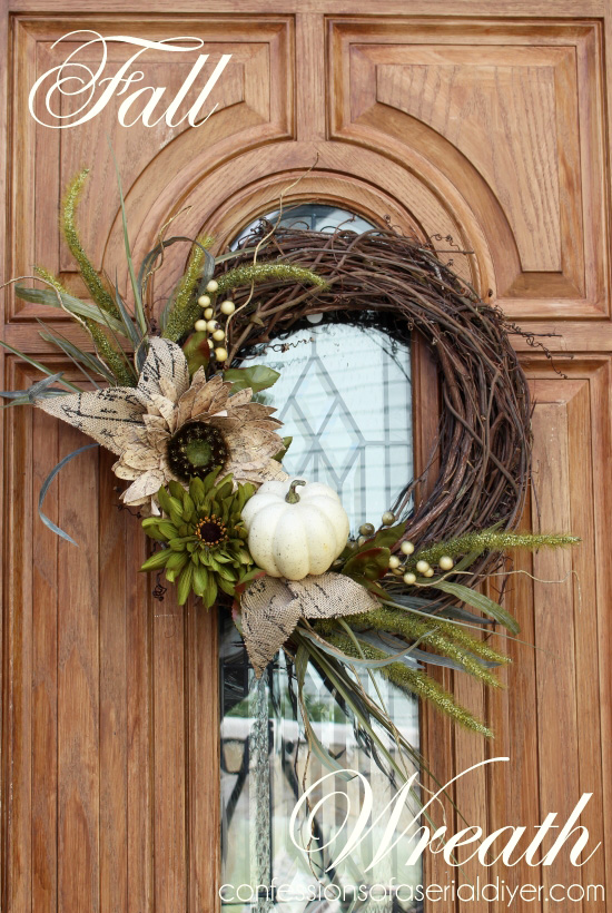 Grapevine wreath decorated with a small pumpkin