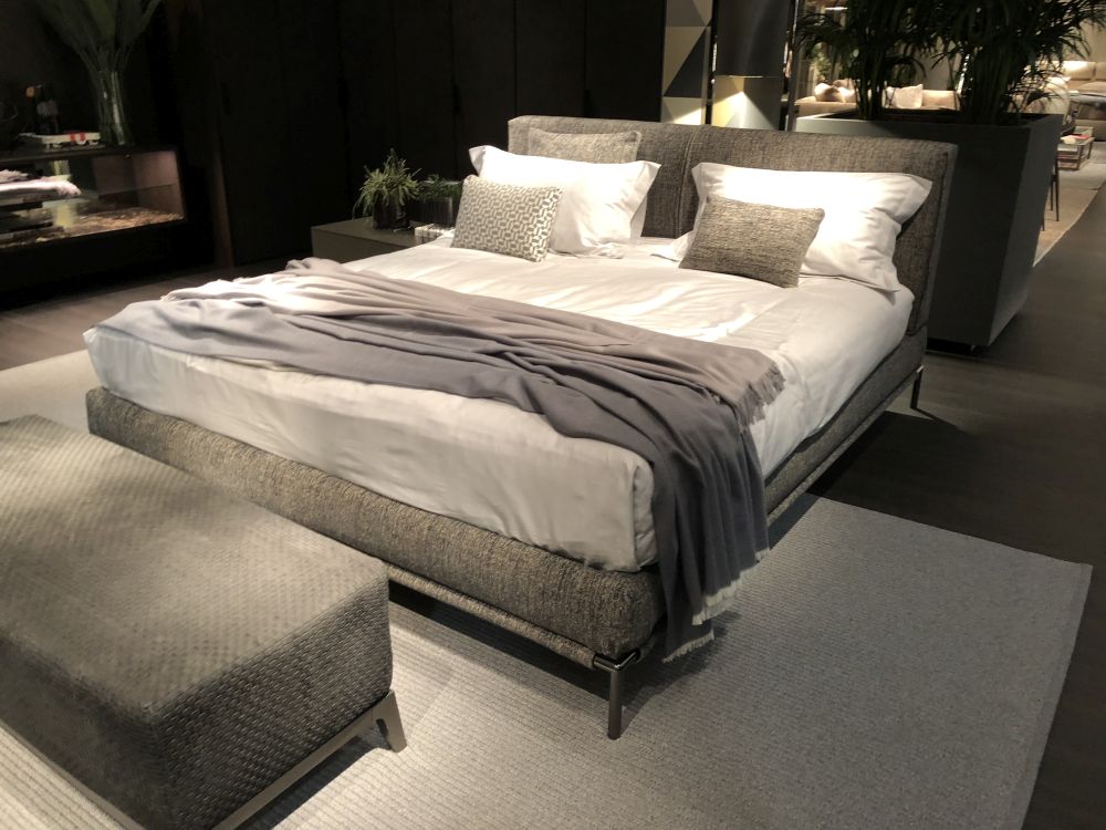 Gray bed with steel legs and bench