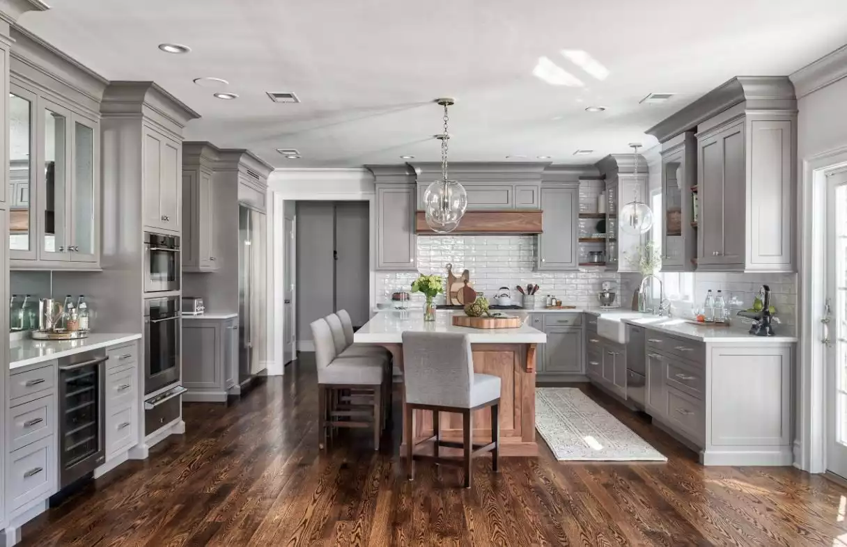 Gray kitchen interior design with white subway tiles