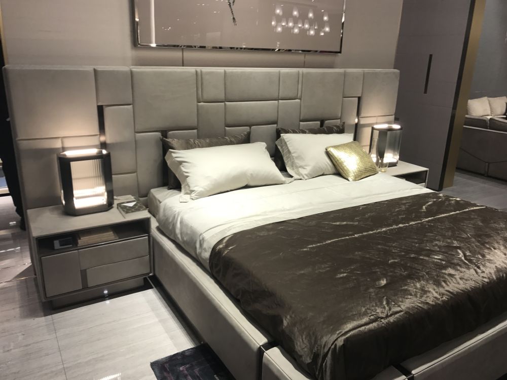 Gray paneled headboard with black instertion