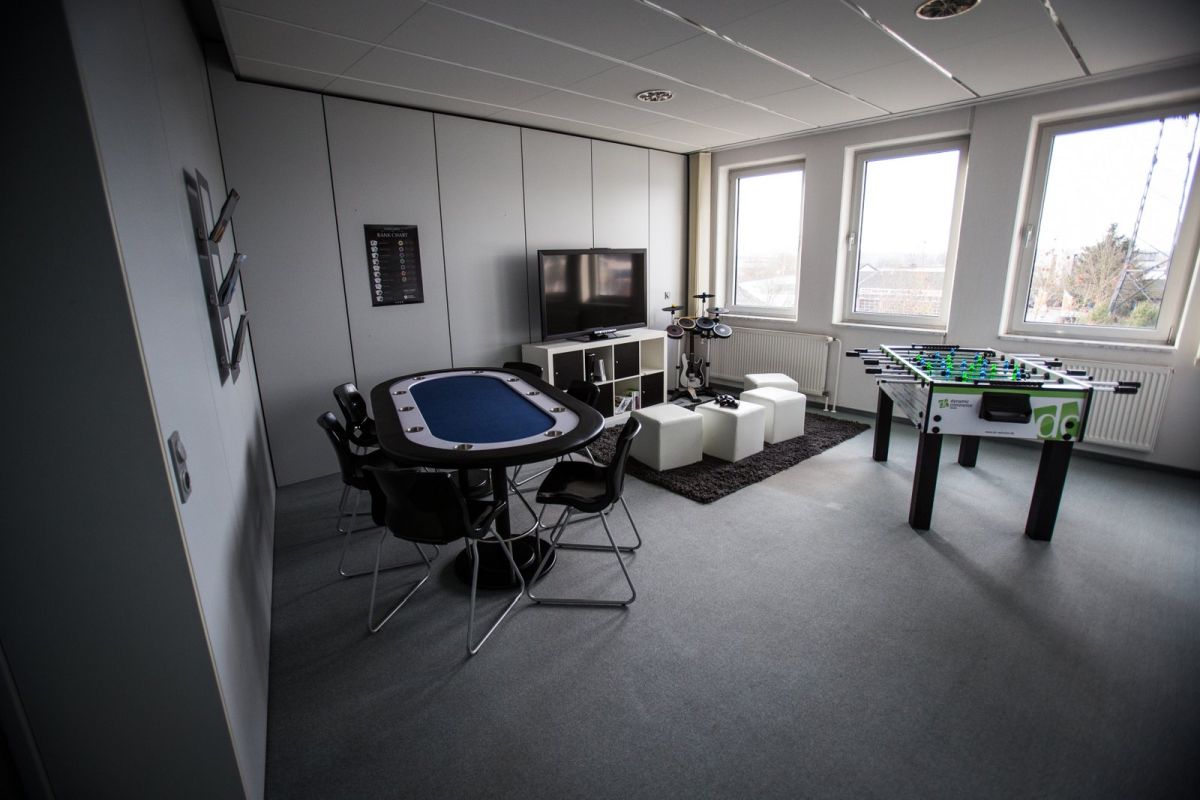 Gray playroom for office with poker table