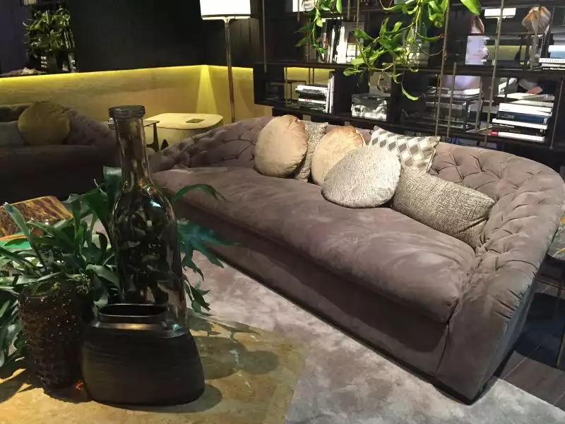 gray-sofa-decorated-with-throw-pillows