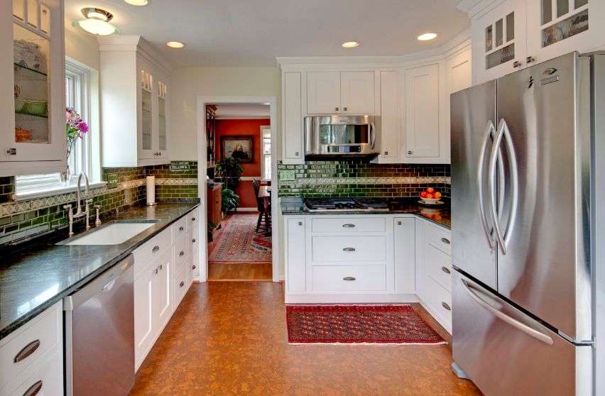 Green subway tiles for backsplash and cork floor