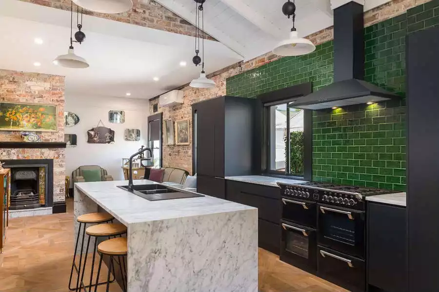 Green sunway tiles for kitchen and exposed bricks