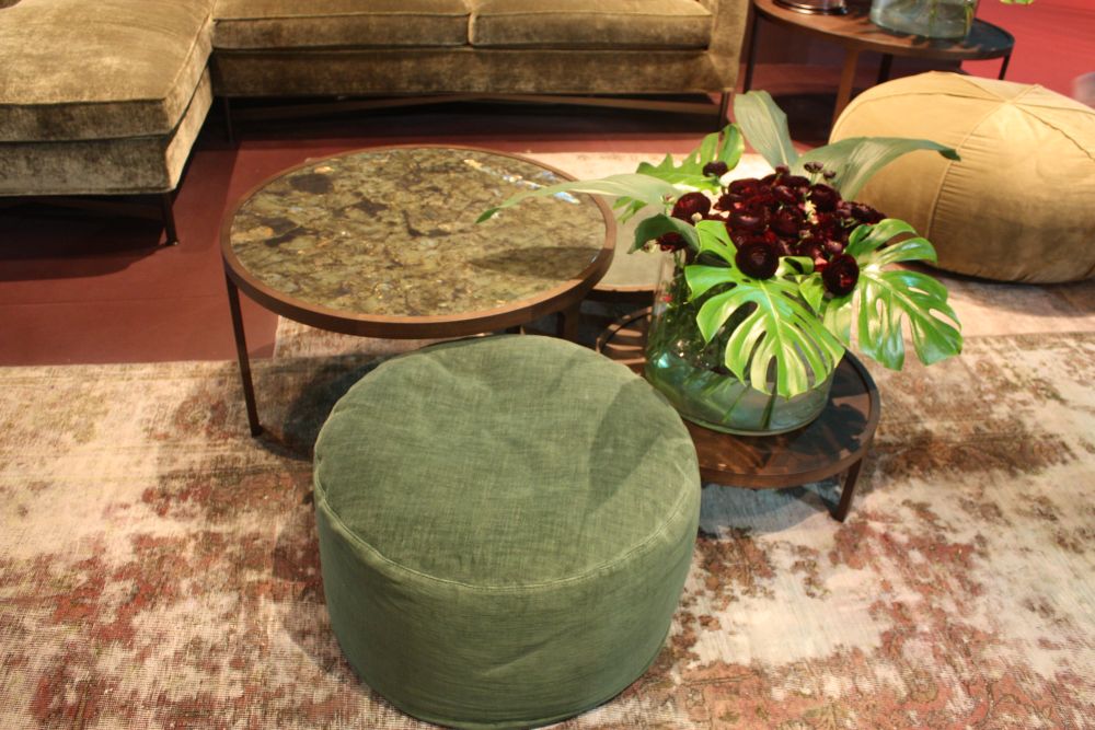 Grouping coffee table with ottoman