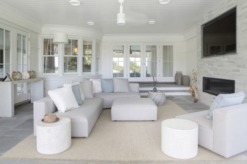 Hamptons Home Decor by Jessica Shaw ​Turett Collaborative fireplace and tv above