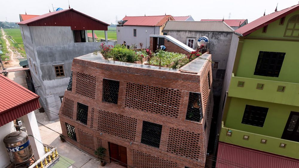 Hanoi perforated brick facade by Vietnamese studio H&P Architects