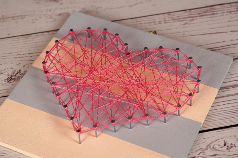 Simple Heart-Shaped Nail String Art Perfect For Beginner DIYers
