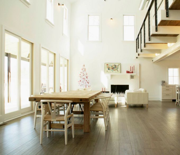 High ceilings dining room with laminate floor