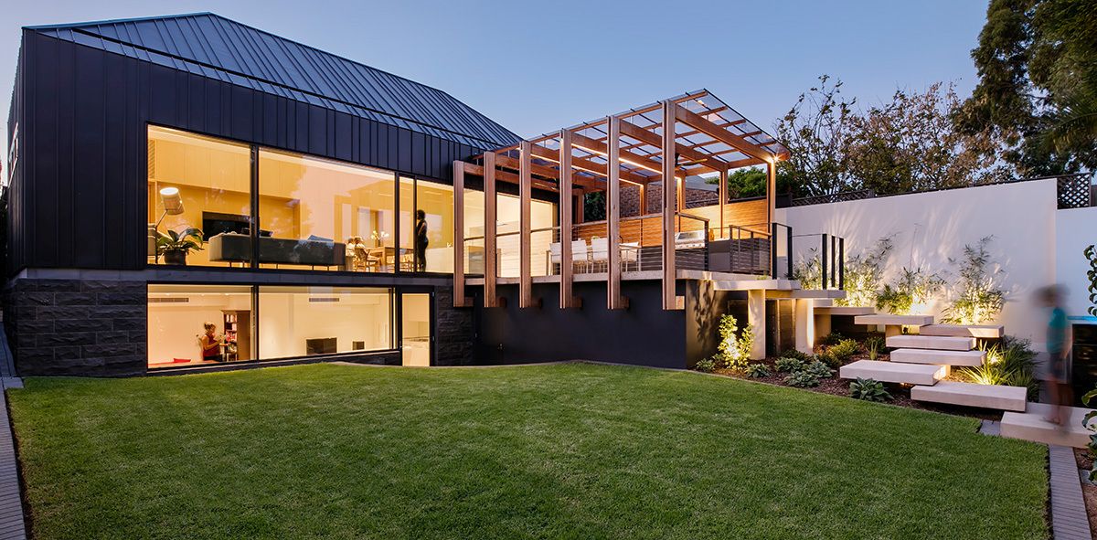 House with a modern pergola extension