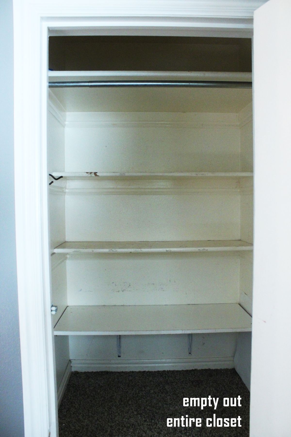 How to Declutter a Closet- totally cleaned out closet