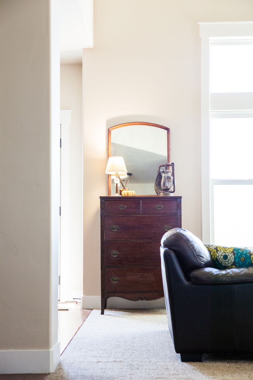 How to Decorate Living Room - sideboard and leather armchair