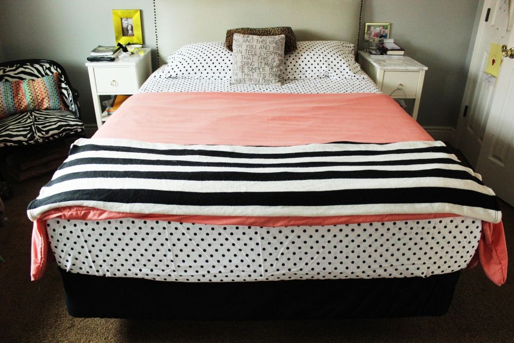 How to Make a Bed Toss a throw blanket