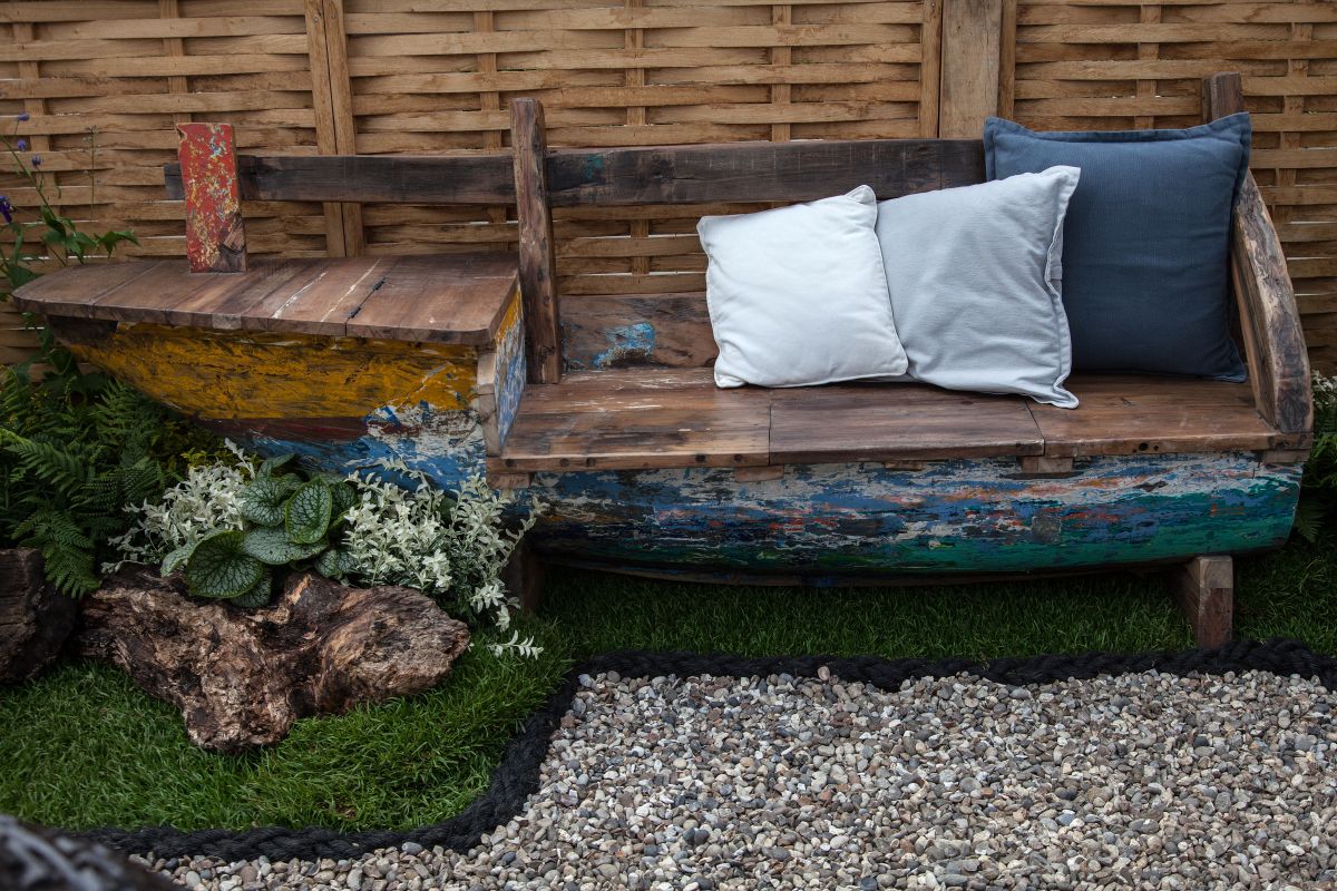 This is a unique bench that was built out of a repurposed old boat