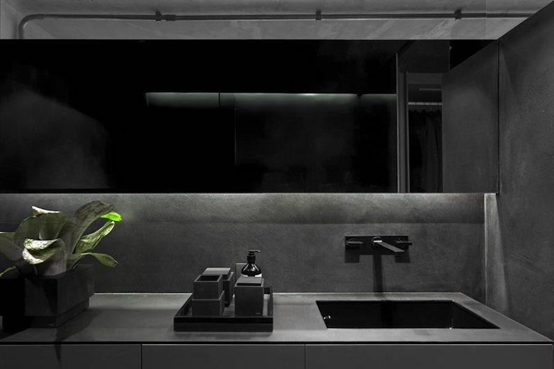 Industrial Sao Paulo loft bathroom sink and mirror