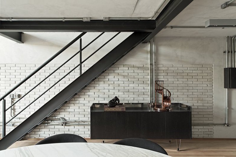 Industrial Sao Paulo loft cabinet under staircase