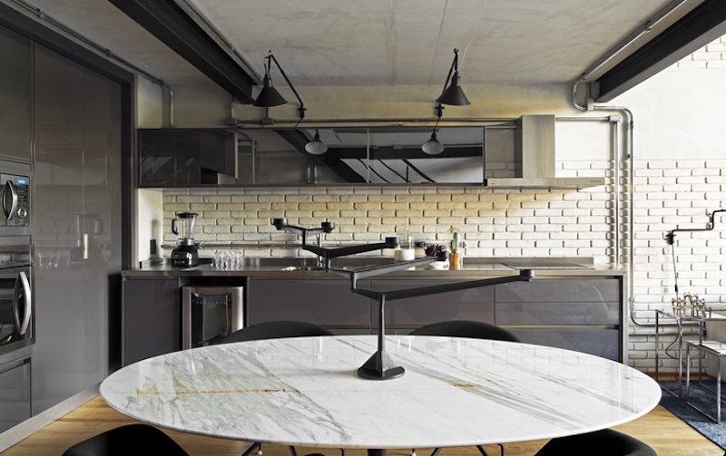 Industrial Sao Paulo loft dining and kitchen area