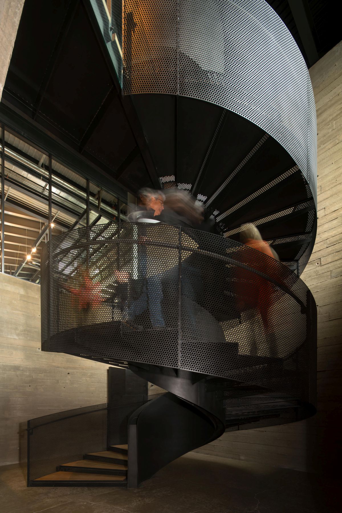 Industrial Spiral Staircase Design with perforated walls