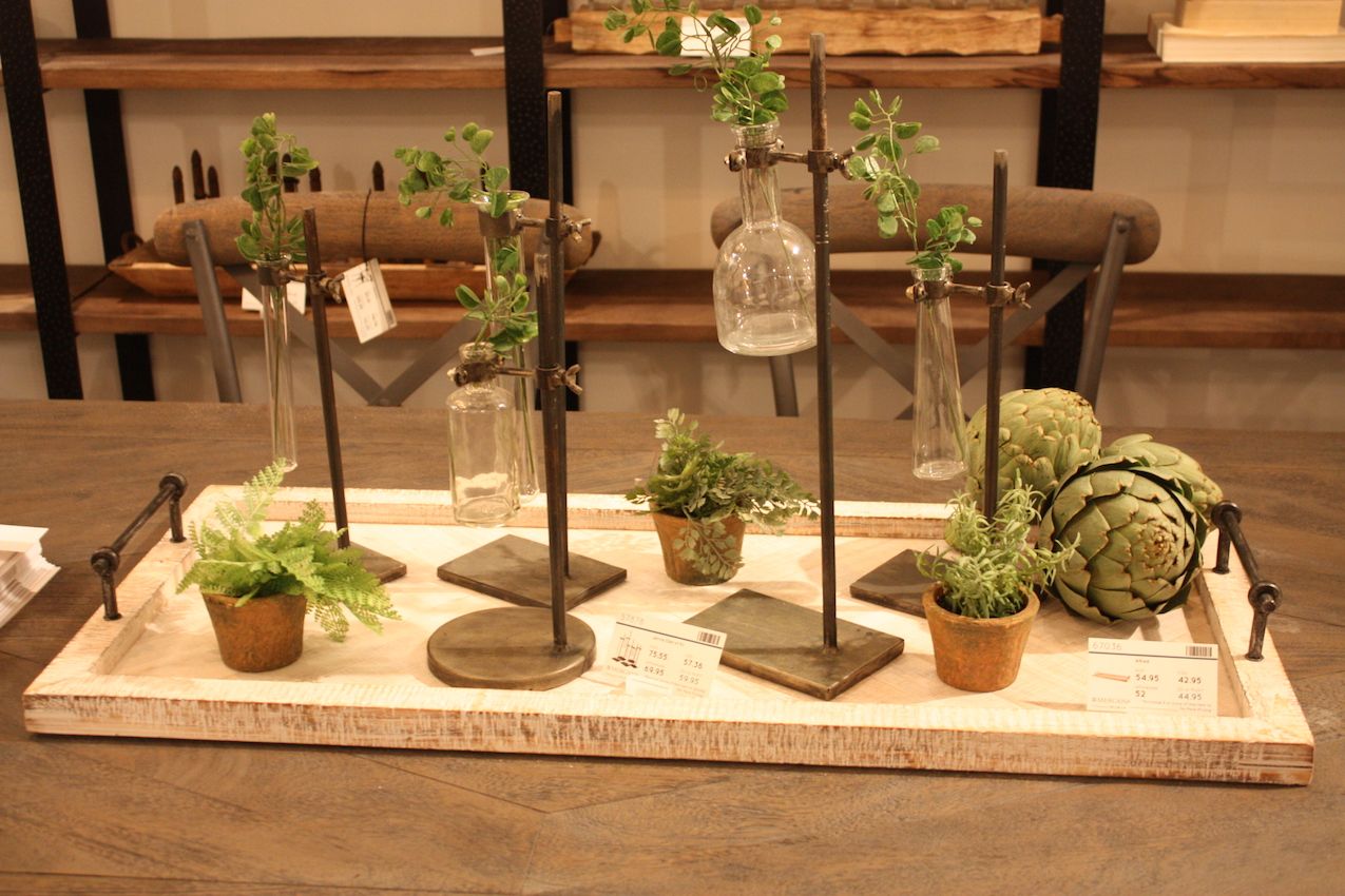 Greenery is a great way to add a lighter touch to a heavy metal decor style.