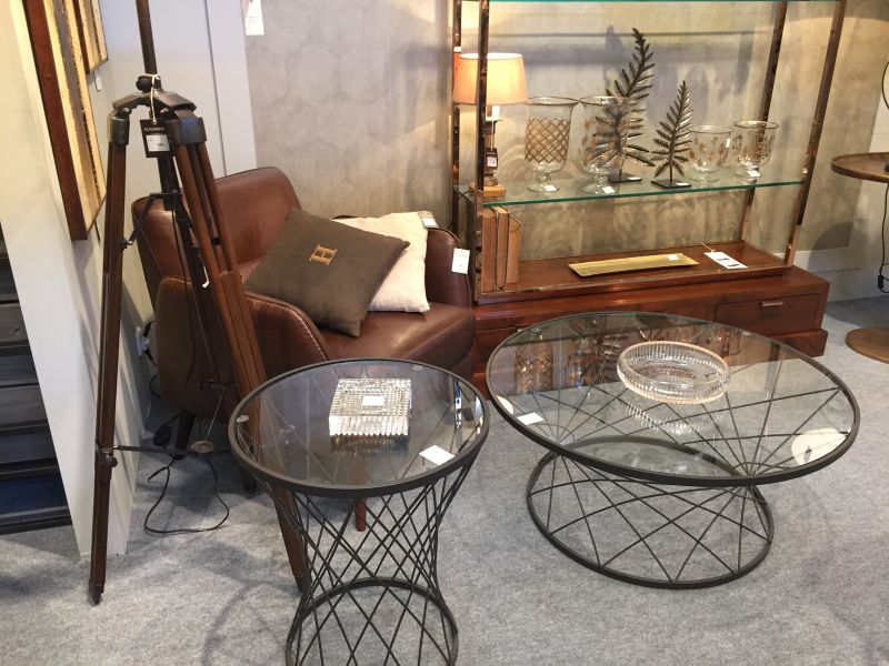 Industrial black wire base coffee table with glass top