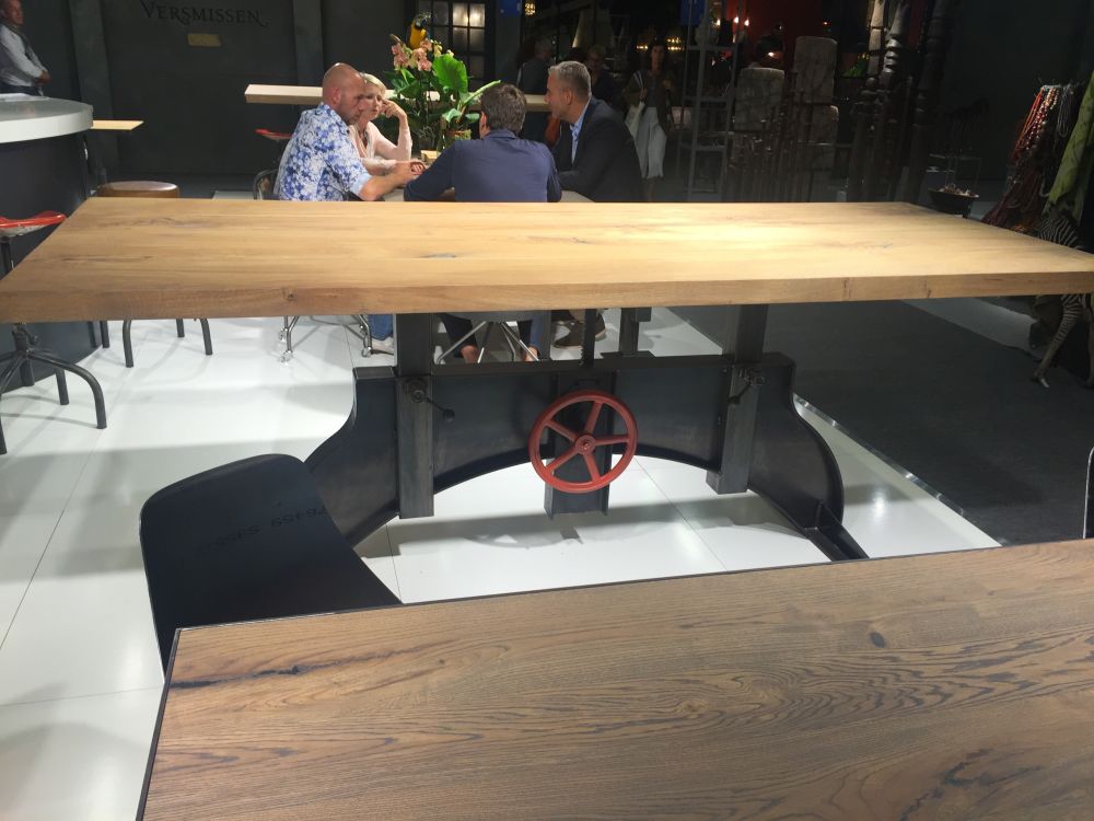 Industrial dining table with a big and ingenious base